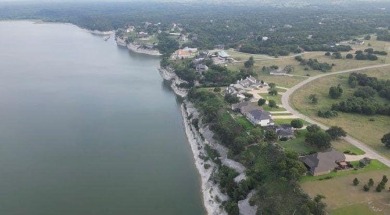 WOW. EXQUISITE WATERFRONT CUSTOM HOME IN EXCLUSIVE GATED GOLF & on White Bluff Resort - Old Course in Texas - for sale on GolfHomes.com, golf home, golf lot