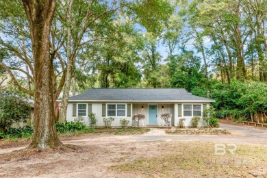 A must see charming Fairhope cottage close to downtown where you on Quail Creek Golf Course in Alabama - for sale on GolfHomes.com, golf home, golf lot