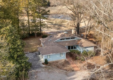 This charming ranch-style home in the gated Carolina Trace on Carolina Trace Country Club in North Carolina - for sale on GolfHomes.com, golf home, golf lot