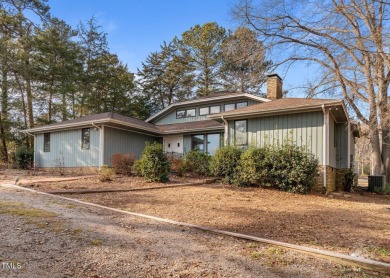 This charming ranch-style home in the gated Carolina Trace on Carolina Trace Country Club in North Carolina - for sale on GolfHomes.com, golf home, golf lot