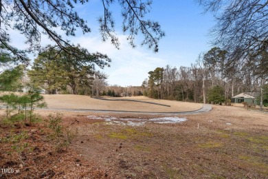 This charming ranch-style home in the gated Carolina Trace on Carolina Trace Country Club in North Carolina - for sale on GolfHomes.com, golf home, golf lot