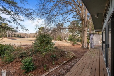 This charming ranch-style home in the gated Carolina Trace on Carolina Trace Country Club in North Carolina - for sale on GolfHomes.com, golf home, golf lot