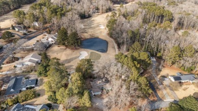 This charming ranch-style home in the gated Carolina Trace on Carolina Trace Country Club in North Carolina - for sale on GolfHomes.com, golf home, golf lot