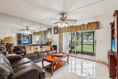 Welcome to this inviting FIRST-FLOOR 1 bedroom, 1.5 bath condo on Flamingo Lakes Country Club in Florida - for sale on GolfHomes.com, golf home, golf lot
