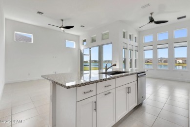 MOVE-IN READY WATERFRONT 4BR/3BA home in sought-after on LPGA International Golf Course in Florida - for sale on GolfHomes.com, golf home, golf lot