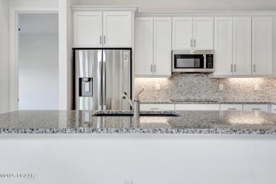 MOVE-IN READY WATERFRONT 4BR/3BA home in sought-after on LPGA International Golf Course in Florida - for sale on GolfHomes.com, golf home, golf lot