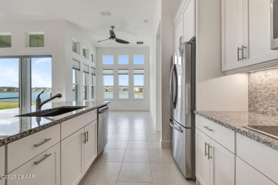 MOVE-IN READY WATERFRONT 4BR/3BA home in sought-after on LPGA International Golf Course in Florida - for sale on GolfHomes.com, golf home, golf lot