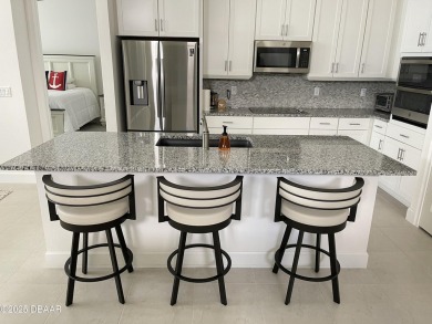 MOVE-IN READY WATERFRONT 4BR/3BA home in sought-after on LPGA International Golf Course in Florida - for sale on GolfHomes.com, golf home, golf lot