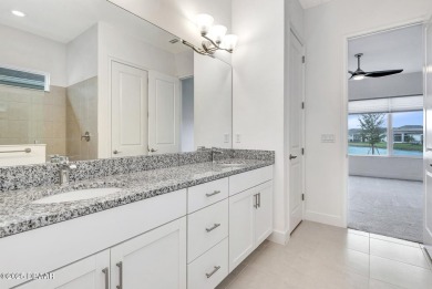 MOVE-IN READY WATERFRONT 4BR/3BA home in sought-after on LPGA International Golf Course in Florida - for sale on GolfHomes.com, golf home, golf lot