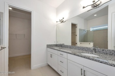 MOVE-IN READY WATERFRONT 4BR/3BA home in sought-after on LPGA International Golf Course in Florida - for sale on GolfHomes.com, golf home, golf lot