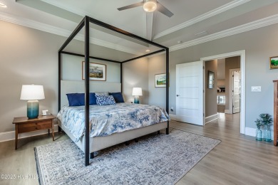 Wake up every day to serene, uninterrupted views of the pond and on Sea Trail Golf Resort in North Carolina - for sale on GolfHomes.com, golf home, golf lot