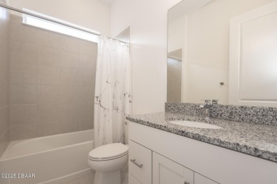MOVE-IN READY WATERFRONT 4BR/3BA home in sought-after on LPGA International Golf Course in Florida - for sale on GolfHomes.com, golf home, golf lot