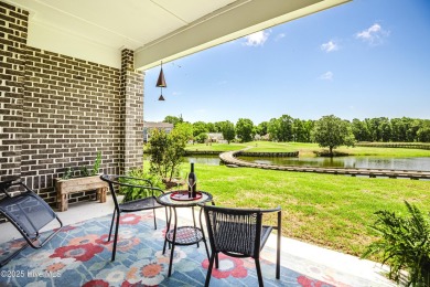 Wake up every day to serene, uninterrupted views of the pond and on Sea Trail Golf Resort in North Carolina - for sale on GolfHomes.com, golf home, golf lot