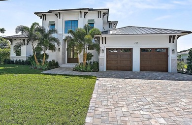 Welcome to your dream home in the heart of Tequesta! This brand on Turtle Creek Club in Florida - for sale on GolfHomes.com, golf home, golf lot