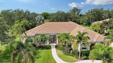 Set on more than half an acre with peaceful lake views, this on Laurel Oak Country Club in Florida - for sale on GolfHomes.com, golf home, golf lot