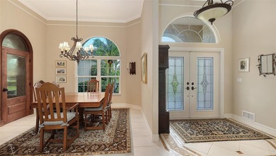 Set on more than half an acre with peaceful lake views, this on Laurel Oak Country Club in Florida - for sale on GolfHomes.com, golf home, golf lot