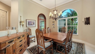 Set on more than half an acre with peaceful lake views, this on Laurel Oak Country Club in Florida - for sale on GolfHomes.com, golf home, golf lot