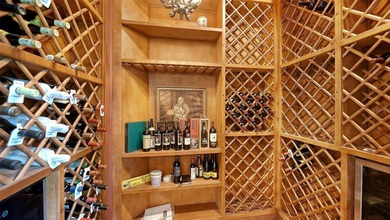 Set on more than half an acre with peaceful lake views, this on Laurel Oak Country Club in Florida - for sale on GolfHomes.com, golf home, golf lot