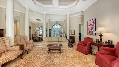 Set on more than half an acre with peaceful lake views, this on Laurel Oak Country Club in Florida - for sale on GolfHomes.com, golf home, golf lot