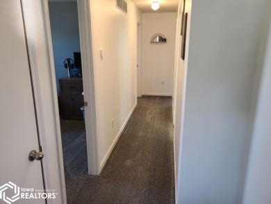 Great 3 bedroom, 1.5 bath split level home with an attached 2 on Linn Grove Country Club in Iowa - for sale on GolfHomes.com, golf home, golf lot