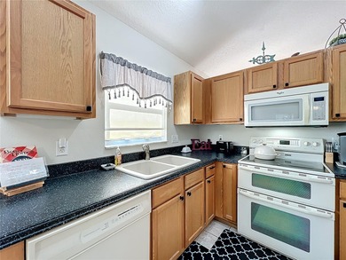 Welcome home to this beautifully maintained 2-bedroom, 2-bath on Plantation Golf Club in Florida - for sale on GolfHomes.com, golf home, golf lot