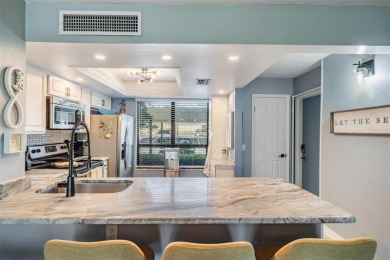 Welcome to one of Cove Cay's coveted seven condos with an on Cove Cay Country Club in Florida - for sale on GolfHomes.com, golf home, golf lot