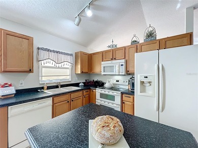 Welcome home to this beautifully maintained 2-bedroom, 2-bath on Plantation Golf Club in Florida - for sale on GolfHomes.com, golf home, golf lot