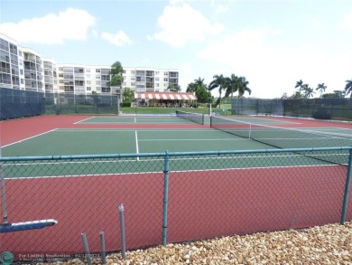 Full Two Bedroom With Lake View On Par 3 Golf Course-Paid Up Rec on Hollybrook Golf and Tennis Club  in Florida - for sale on GolfHomes.com, golf home, golf lot