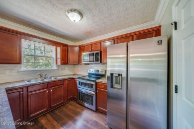 Welcome to this beautifully maintained 4-bedroom, 2.5 bathroom on Polo Fields Golf and Country Club in Kentucky - for sale on GolfHomes.com, golf home, golf lot