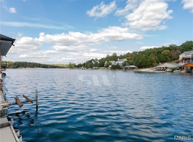 Welcome to Raintree Village Condominiums!  This 2-bedroom, 1 on Raintree Country Club in Missouri - for sale on GolfHomes.com, golf home, golf lot