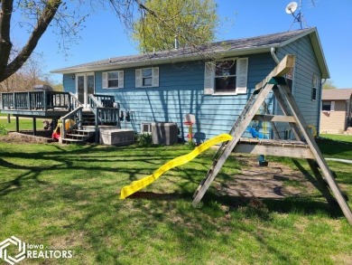 Great 3 bedroom, 1.5 bath split level home with an attached 2 on Linn Grove Country Club in Iowa - for sale on GolfHomes.com, golf home, golf lot