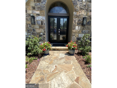 Prepare to be captivated by this storybook stone estate, a rare on Atlanta Country Club in Georgia - for sale on GolfHomes.com, golf home, golf lot