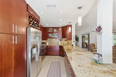 Tucked inside a quiet cul-de-sac within the desirable Woodmans on The Meadows Golf and Country Club in Florida - for sale on GolfHomes.com, golf home, golf lot