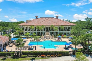 Savor the sunset views over the lake, clubhouse, golf course and on The Club At Grandezza in Florida - for sale on GolfHomes.com, golf home, golf lot