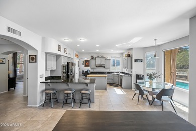 Stunning 4-bedroom, 3-bath home on the golf course in Ahwatukee on The Foothills Golf Club in Arizona - for sale on GolfHomes.com, golf home, golf lot