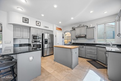 Stunning 4-bedroom, 3-bath home on the golf course in Ahwatukee on The Foothills Golf Club in Arizona - for sale on GolfHomes.com, golf home, golf lot