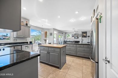 Stunning 4-bedroom, 3-bath home on the golf course in Ahwatukee on The Foothills Golf Club in Arizona - for sale on GolfHomes.com, golf home, golf lot