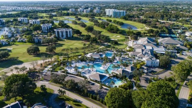 Enjoy tranquil golf course vistas from all angles and the on Boca West Golf and Country Club in Florida - for sale on GolfHomes.com, golf home, golf lot
