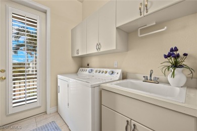 Located in the sought-after Beachview community, this stunning on Beachview Golf Club in Florida - for sale on GolfHomes.com, golf home, golf lot
