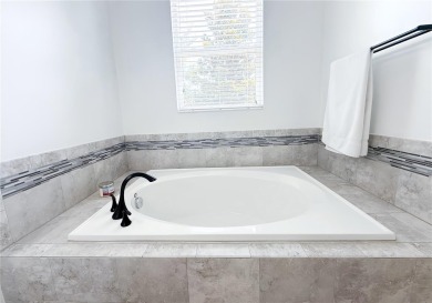 MANY UPGRADES!! Welcome to this exclusive gated community of on The Oasis Club at Champions Gate in Florida - for sale on GolfHomes.com, golf home, golf lot