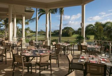 Enjoy tranquil golf course vistas from all angles and the on Boca West Golf and Country Club in Florida - for sale on GolfHomes.com, golf home, golf lot