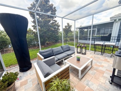 MANY UPGRADES!! Welcome to this exclusive gated community of on The Oasis Club at Champions Gate in Florida - for sale on GolfHomes.com, golf home, golf lot