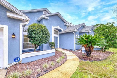 Where the tranquility of the water meets the refinement of on Fairway Oaks at Magnolia Golf Course in Florida - for sale on GolfHomes.com, golf home, golf lot