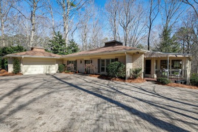 STUNNING views of MacGregor Downs Golf Course - IMMACULATE and on MacGregor Downs Country Club in North Carolina - for sale on GolfHomes.com, golf home, golf lot