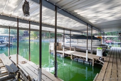 Come visit this beautiful home with a seasonal lake view in the on Bayview Golf Course in Missouri - for sale on GolfHomes.com, golf home, golf lot