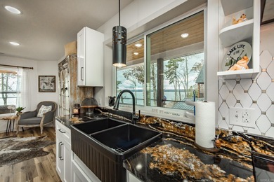 This incredible LAKE HOME, just a year old, offers phenomenal on Tannenbaum Golf Club in Arkansas - for sale on GolfHomes.com, golf home, golf lot