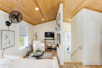Discover your ideal canal front cottage right in time for on Founders Club At St. James Plantation in North Carolina - for sale on GolfHomes.com, golf home, golf lot