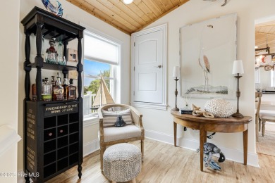 Discover your ideal canal front cottage right in time for on Founders Club At St. James Plantation in North Carolina - for sale on GolfHomes.com, golf home, golf lot
