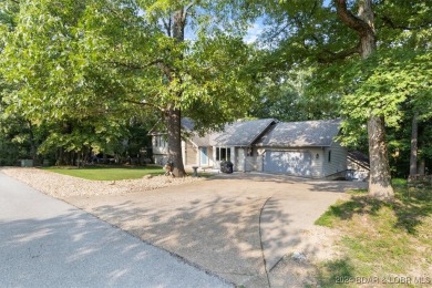 Come visit this beautiful home with a seasonal lake view in the on Bayview Golf Course in Missouri - for sale on GolfHomes.com, golf home, golf lot