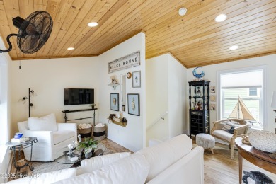 Discover your ideal canal front cottage right in time for on Founders Club At St. James Plantation in North Carolina - for sale on GolfHomes.com, golf home, golf lot